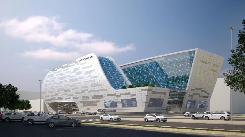 Steigenberger Hotel Doha Exterior foto The image shows a modern architectural building with a futuristic design. The structure features large glass windows and a dynamic, flowing shape, combining different materials like metal and stone. There are green areas on the roof, and several scre